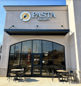 Sign in the front of store at pasta project